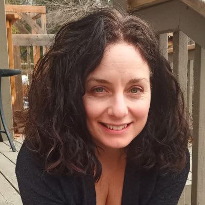 headshot of Adrienne