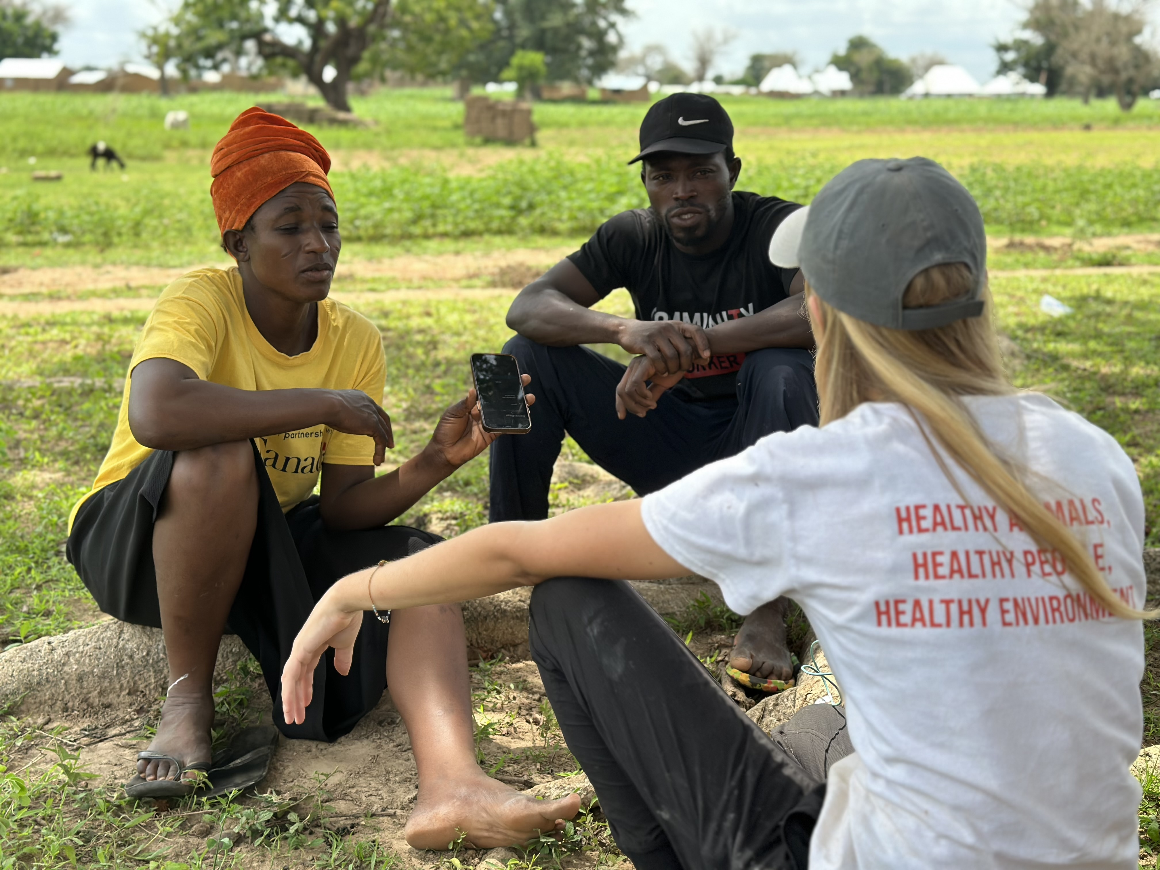 marley chatting with community animal health workers