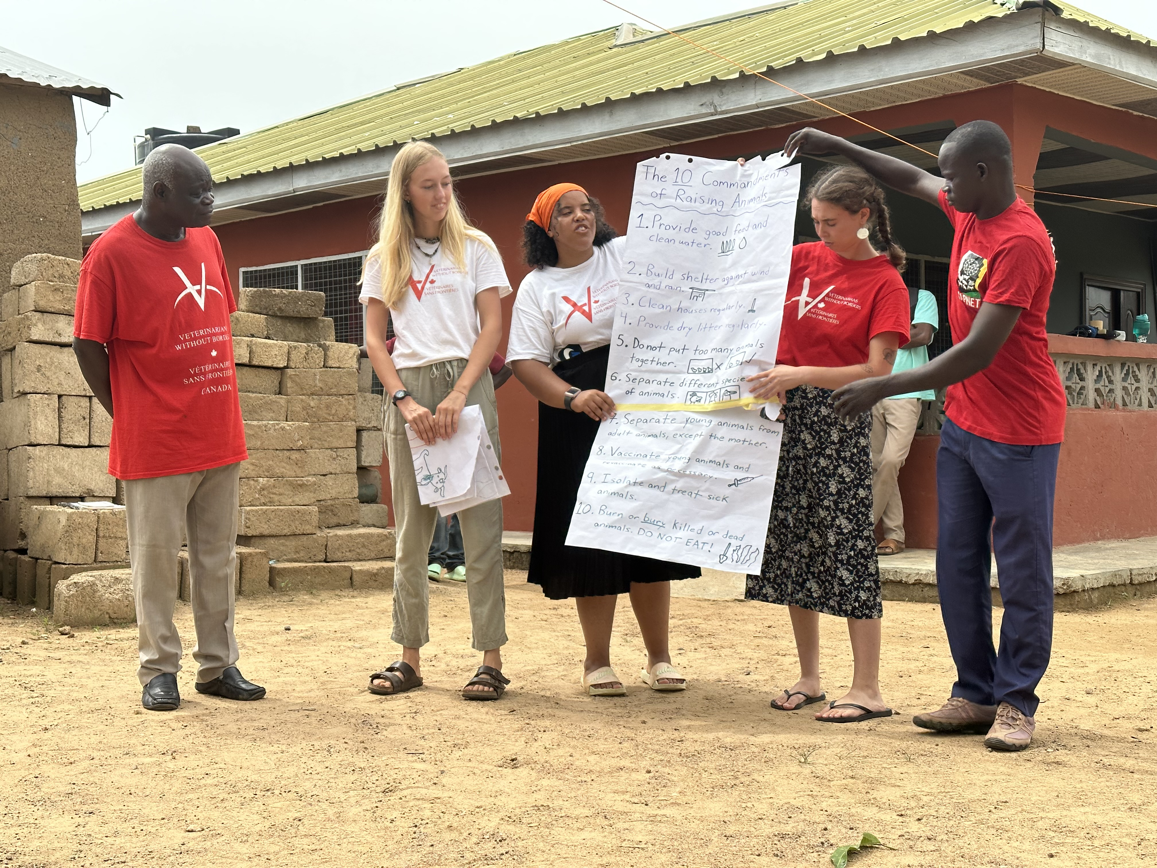 VETS volunteers in Ghana giving presentation
