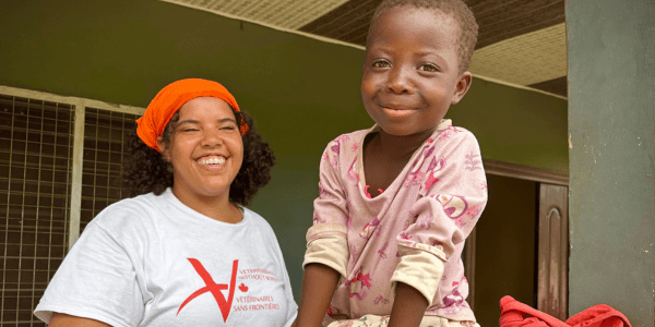 Dr. Keisha Harris with a child in Ghana